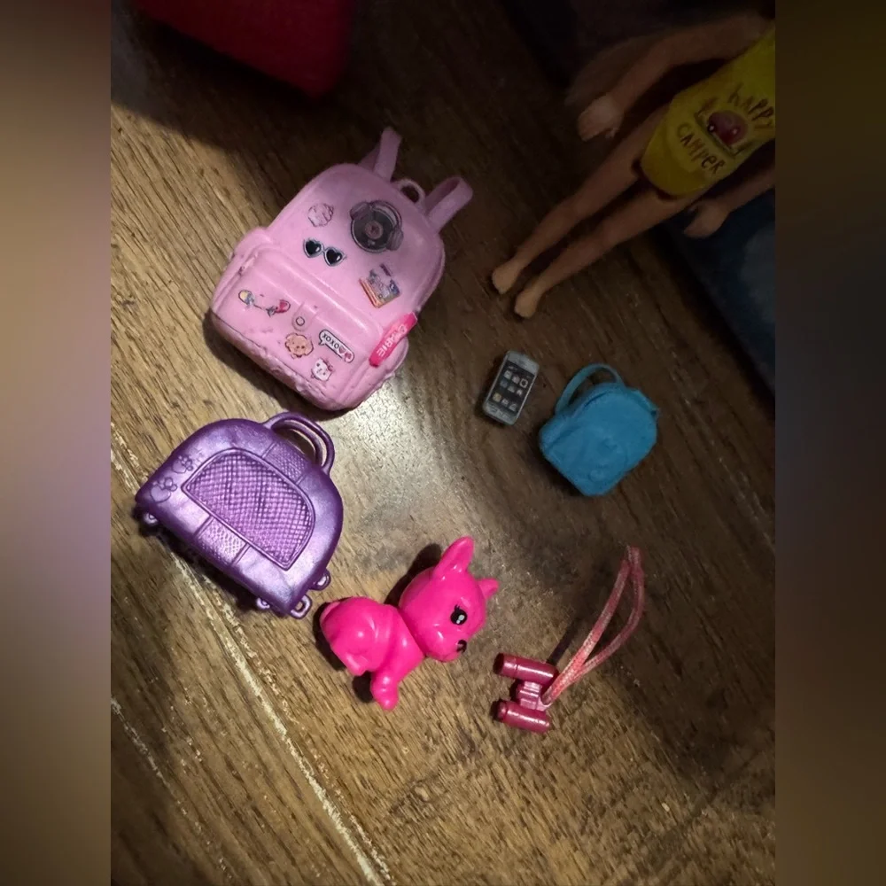 Barbie includes her
